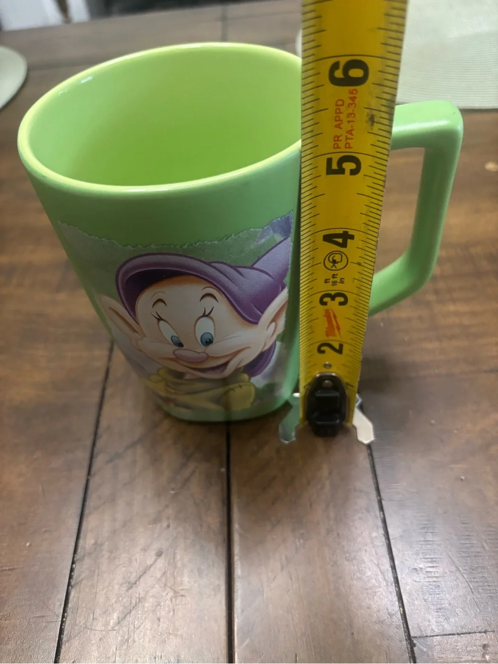 Large green ceramic Disney store dopey Snow White mug holds 18 ounces